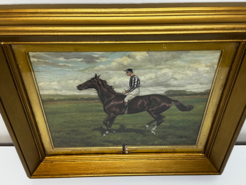 A Victorian equestrian oil painting set within a moulded gold gilt frame, depicting a brown racehorse and jockey in a field under a cloudy sky. View XIV