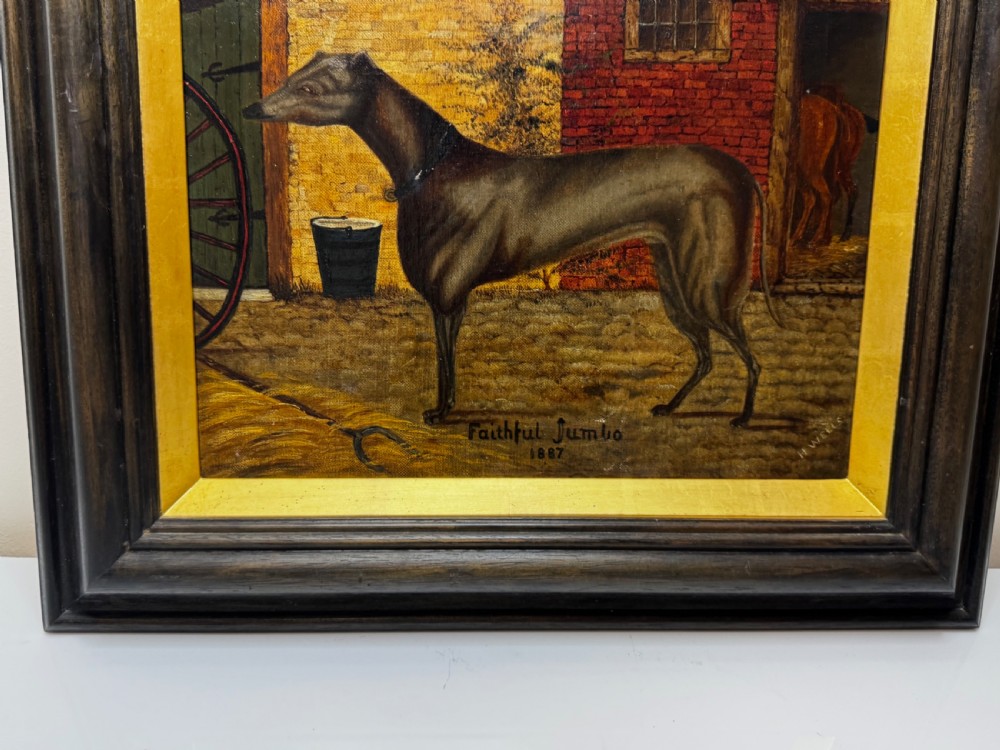 A Victorian oil painting depicting a dark brown greyhound standing in profile within a courtyard, presented in a dark molded wooden frame with a gold slip. View VIII