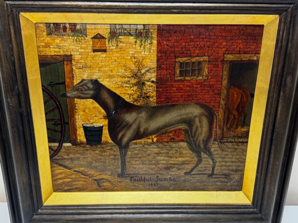 A Victorian oil painting depicting a dark brown greyhound standing in profile within a courtyard, presented in a dark molded wooden frame with a gold slip. View XI