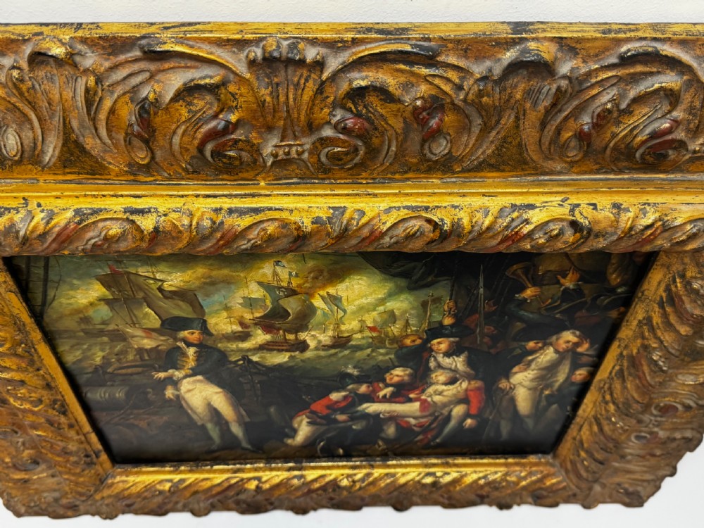 An antique oil painting depicting a dramatic naval sea battle with officers on a ship deck, housed in a heavily carved gold leaf frame. View VII