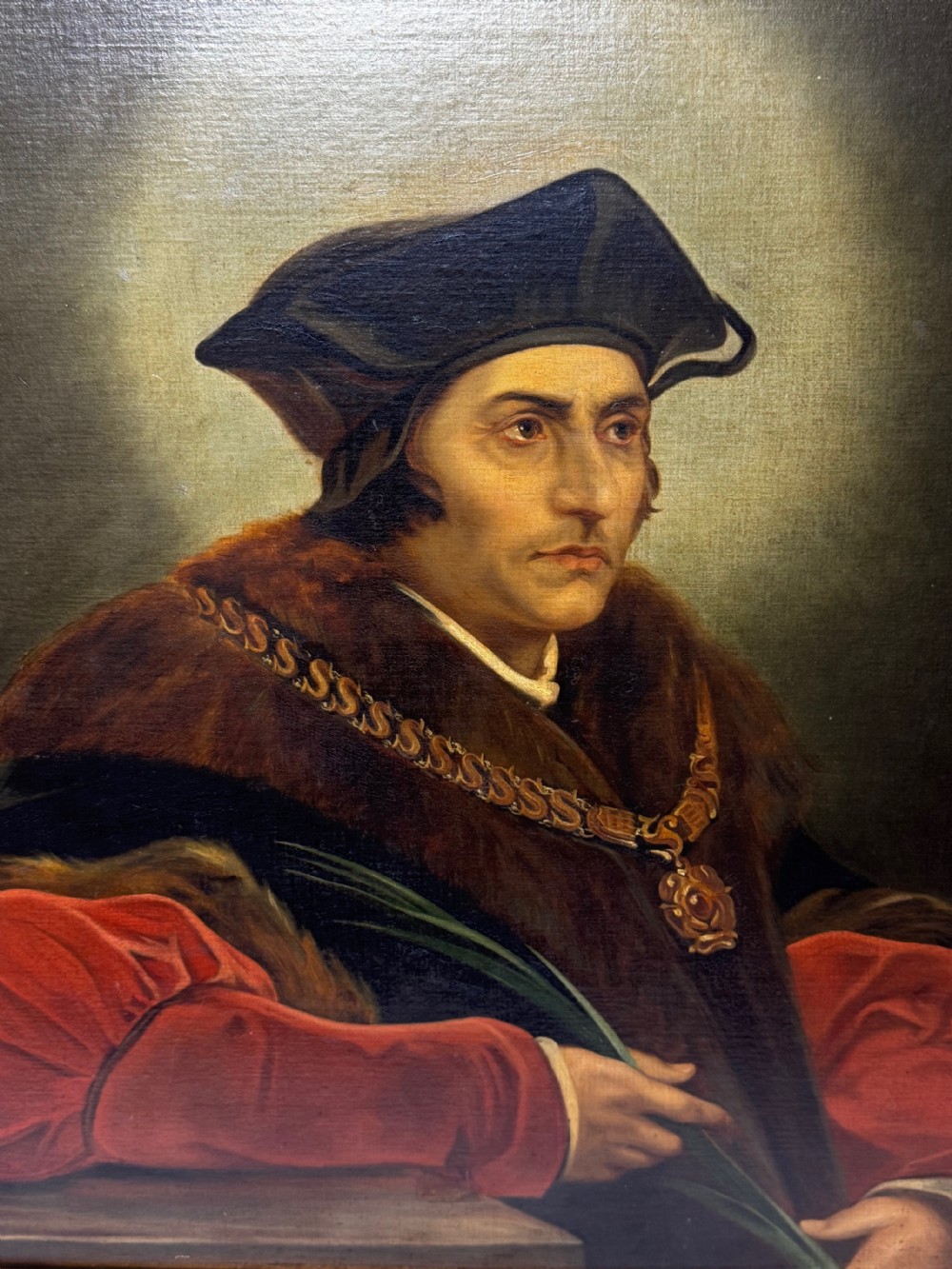 An oil portrait painting depicting Sir Thomas More framed in an ornate gold gilt wood frame. View XI