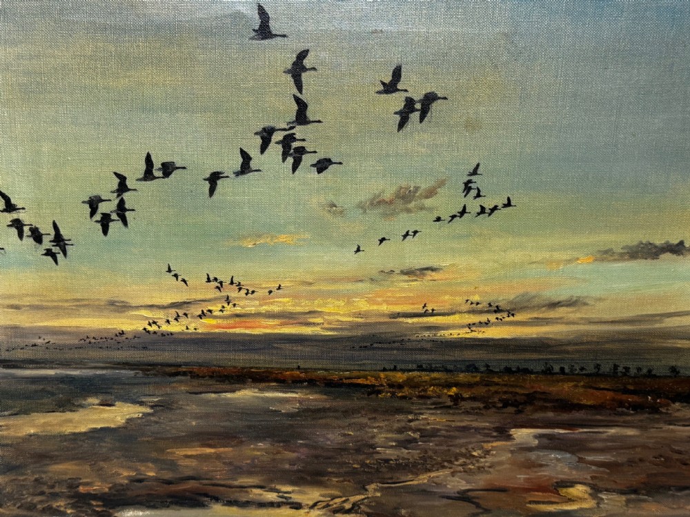 Framed oil painting depicting a skein of geese in flight over coastal marshlands at dusk. View XI