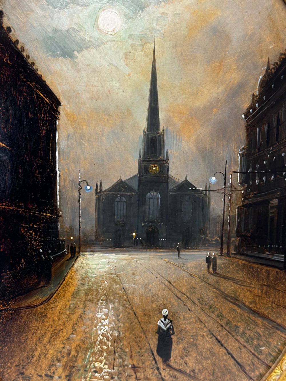 An oval Victorian oil painting depicting a wet night street lit by moonlight leading towards a church spire, framed in a carved gilt frame. View XIV