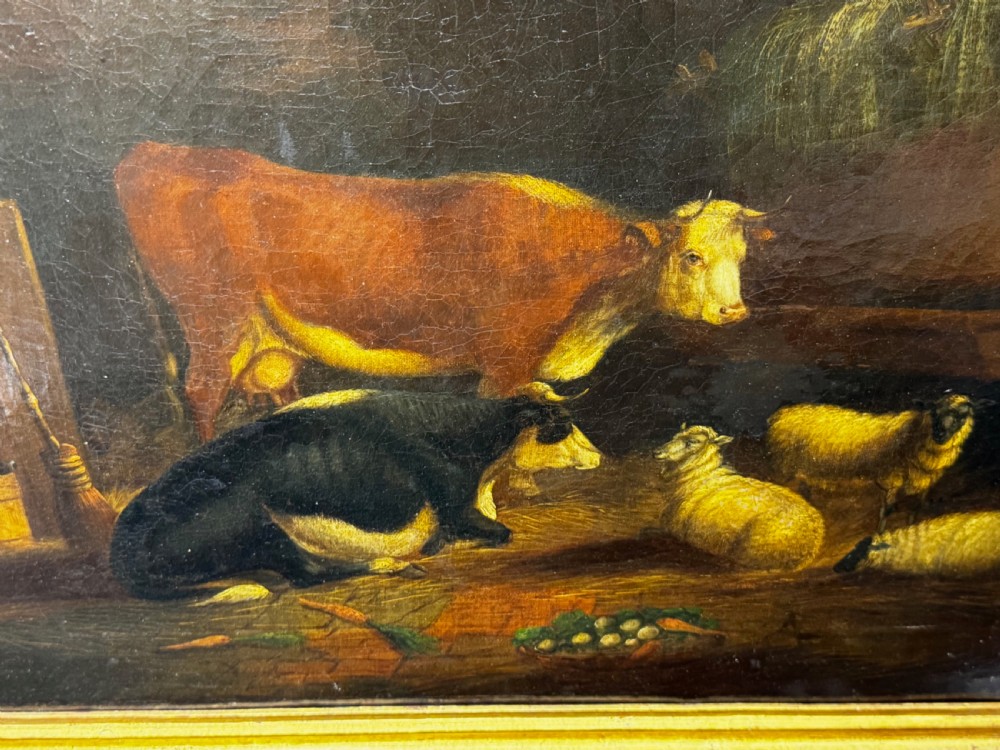 A 19th-century oil painting depicting cattle and sheep resting inside a dimly lit barn beside a hay rack and root vegetables on the floor. View XXVI