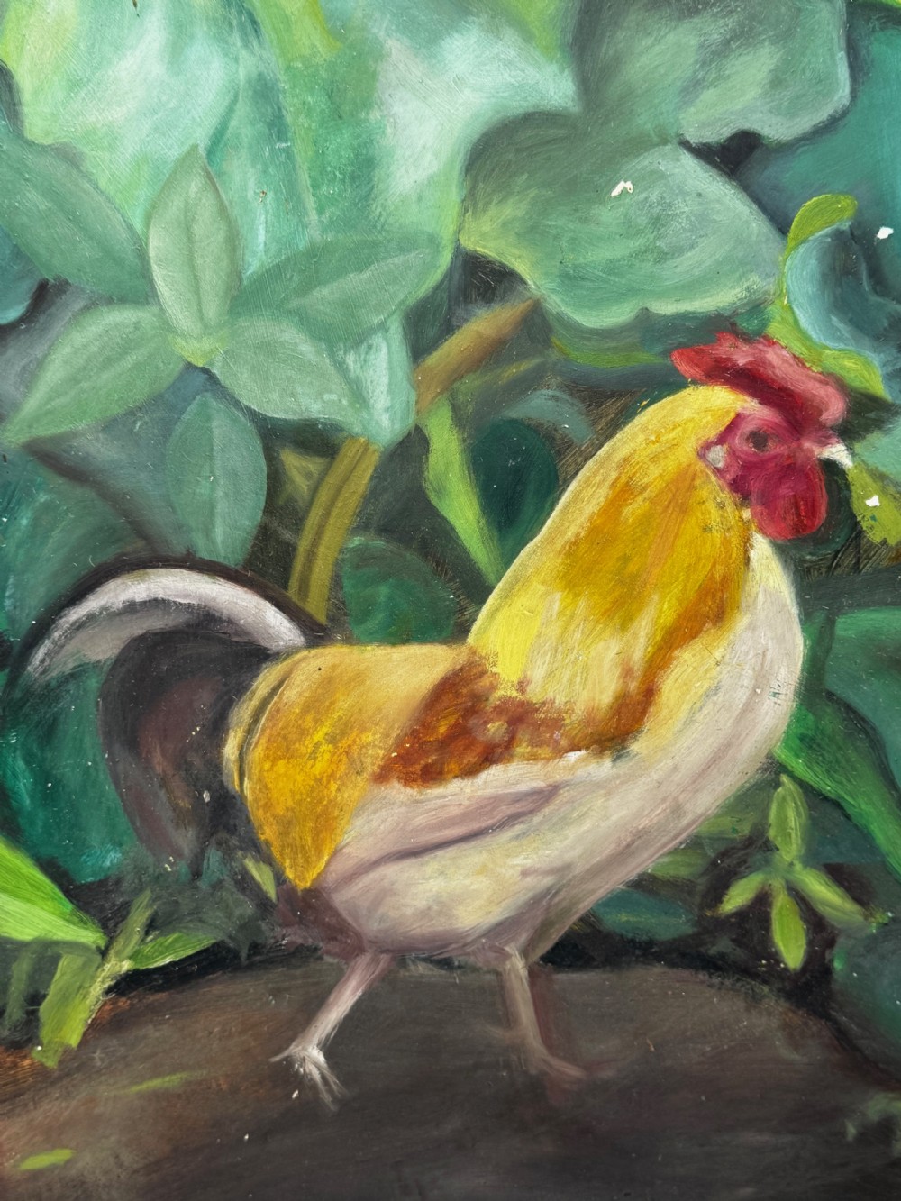 An oil painting depicting a yellow and red cockerel amidst dense green leaves, set within a carved dark wood frame with extended corner joints. View XIII