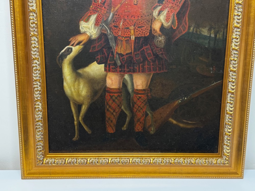 An 18th-century oil painting depicting a Scottish noble standing in tartan attire beside a hunting hound, set within a carved gilt frame. View XV