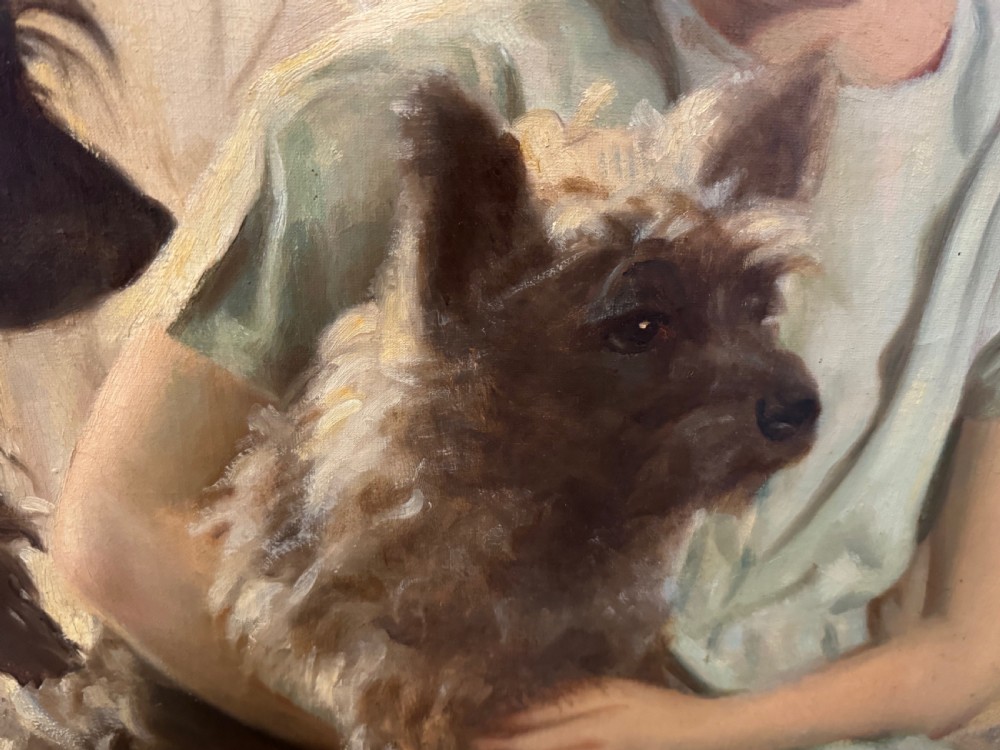 A mid-20th-century oil portrait depicting a young girl with blonde curly hair holding a Cairn Terrier. View II