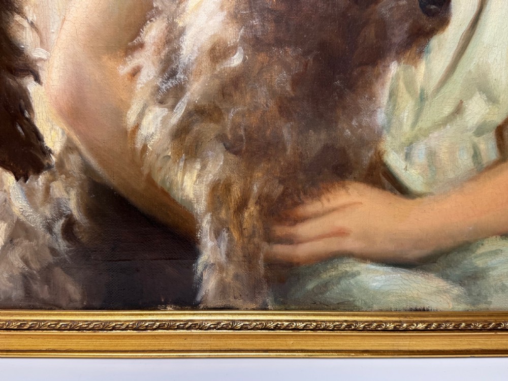 A mid-20th-century oil portrait depicting a young girl with blonde curly hair holding a Cairn Terrier. View XVIII