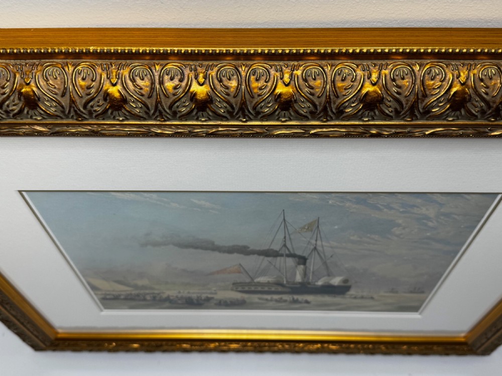 A framed 19th-century marine painting depicting a paddle steamer yacht on open water surrounded by smaller boats, housed within an ornate giltwood frame. View II