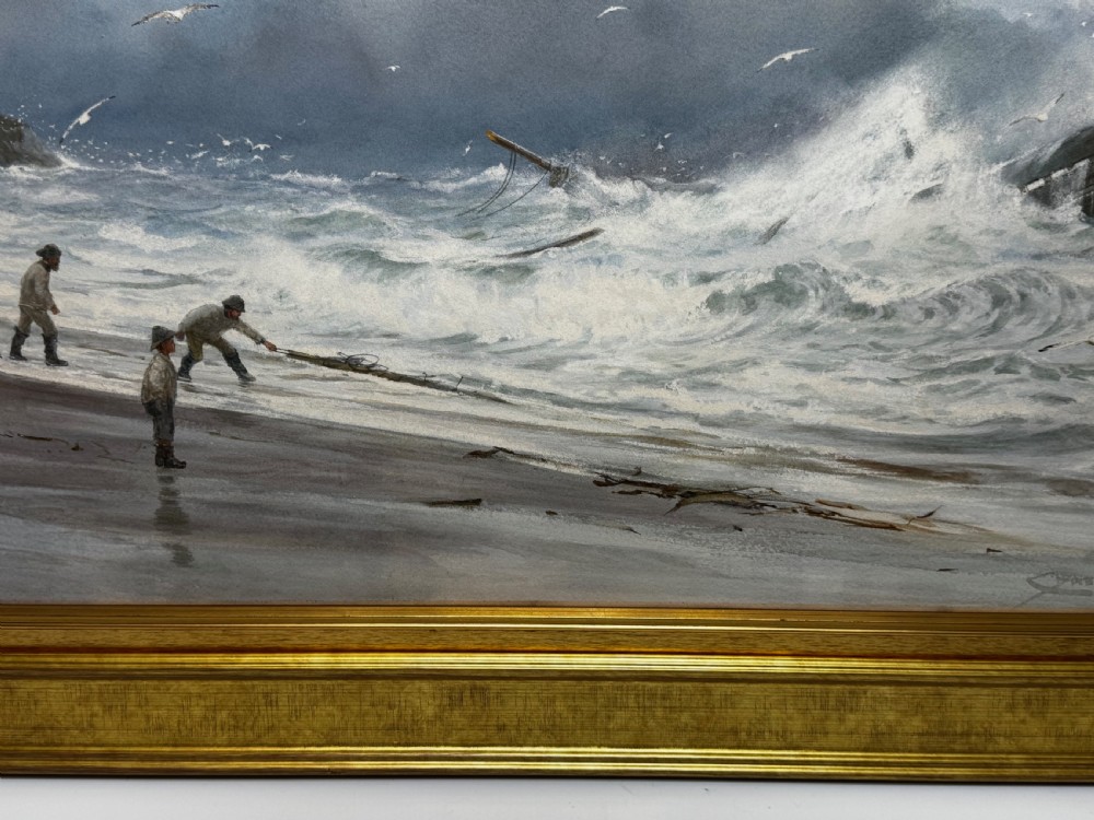A 19th-century oil painting depicting figures on a shore watching a shipwreck in turbulent seas, set within a molded gilt frame. View IV