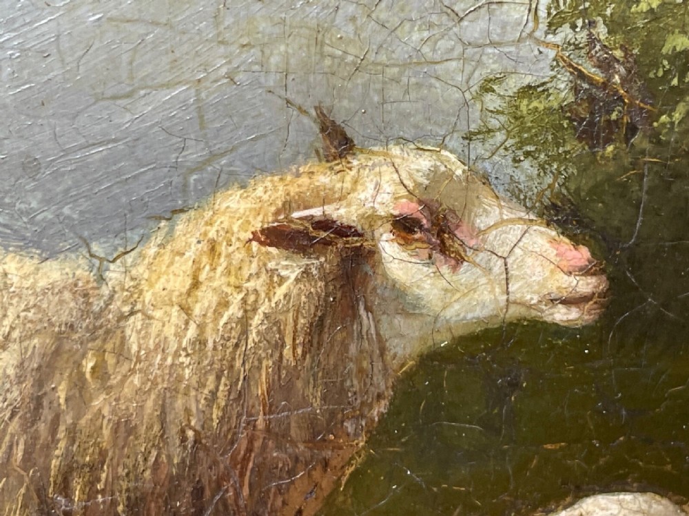 A pair of 19th-century oil paintings in ornate gilt frames depicting sheep, lambs, and goats resting in green pastoral landscapes. View VII