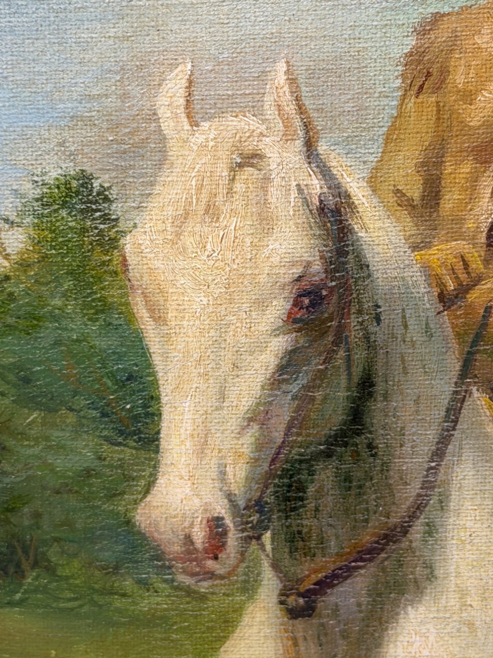An oil painting depicting a man in a hat and buckskin jacket riding a grey horse along a rural path, set within an ornate gilded wooden frame. View XI