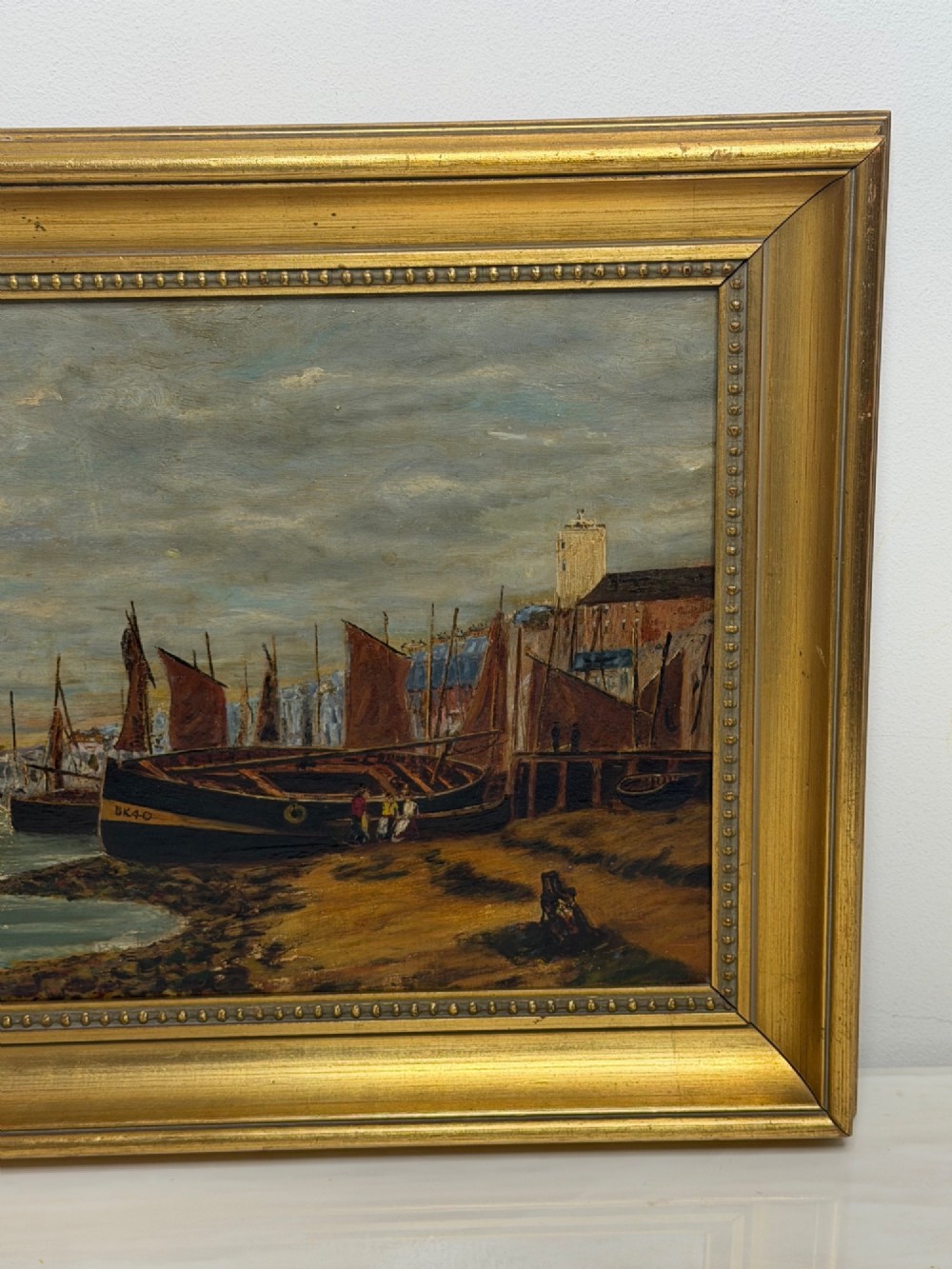 A 19th-century framed oil painting depicting sailing boats in North Shields harbour under an overcast sky. View IV