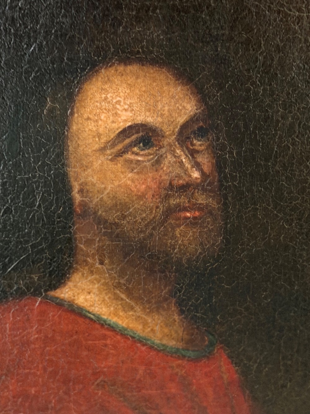 A framed Victorian oil painting depicting Daniel in a red robe seated inside a dark cavern surrounded by lions. View III