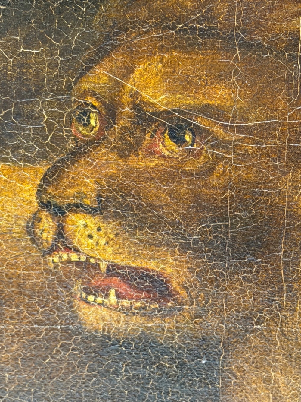 A framed Victorian oil painting depicting Daniel in a red robe seated inside a dark cavern surrounded by lions. View VIII