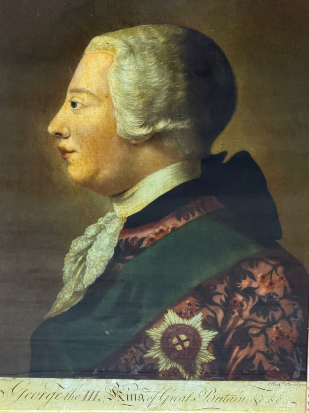 An 18th-century reverse glass mezzotint profile portrait of King George III housed within a decorative gilt frame. View IV