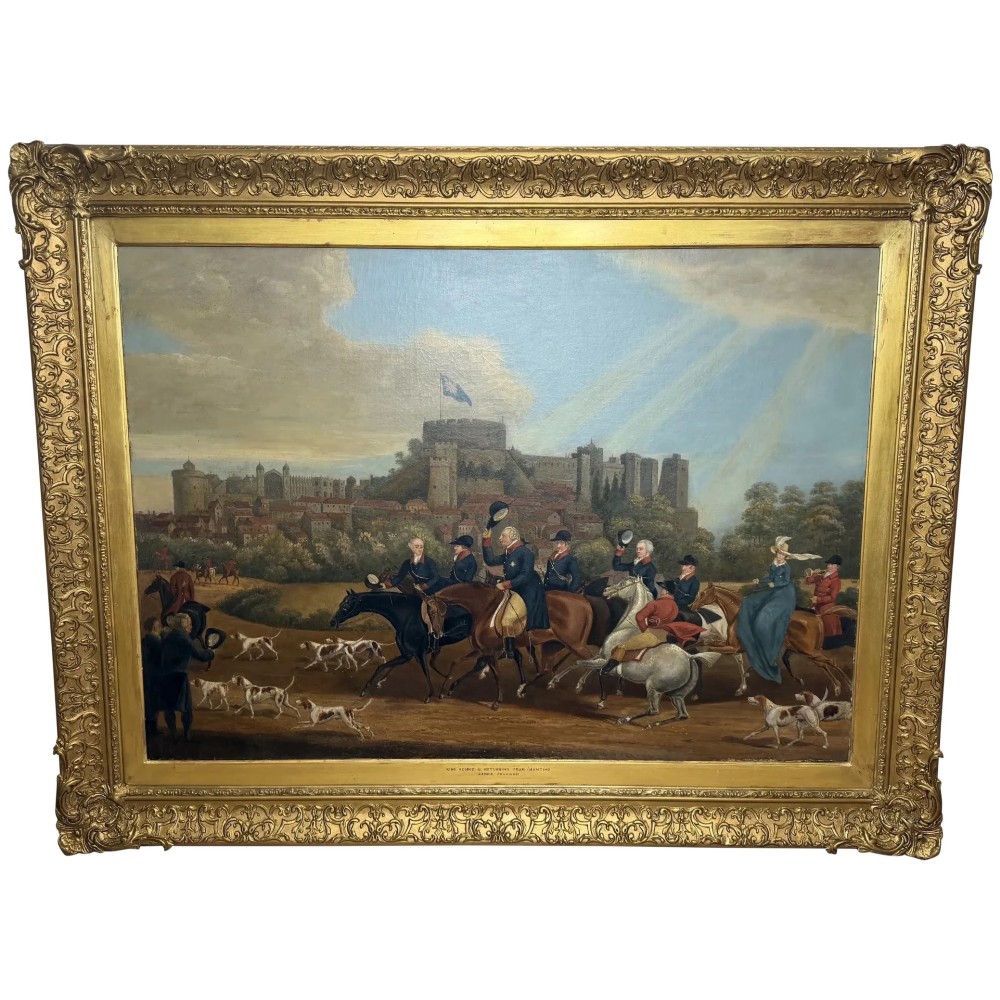 An antique oil painting on canvas depicting King George and hunters on horseback with hounds before Windsor Castle, housed in an ornate carved gilt frame.