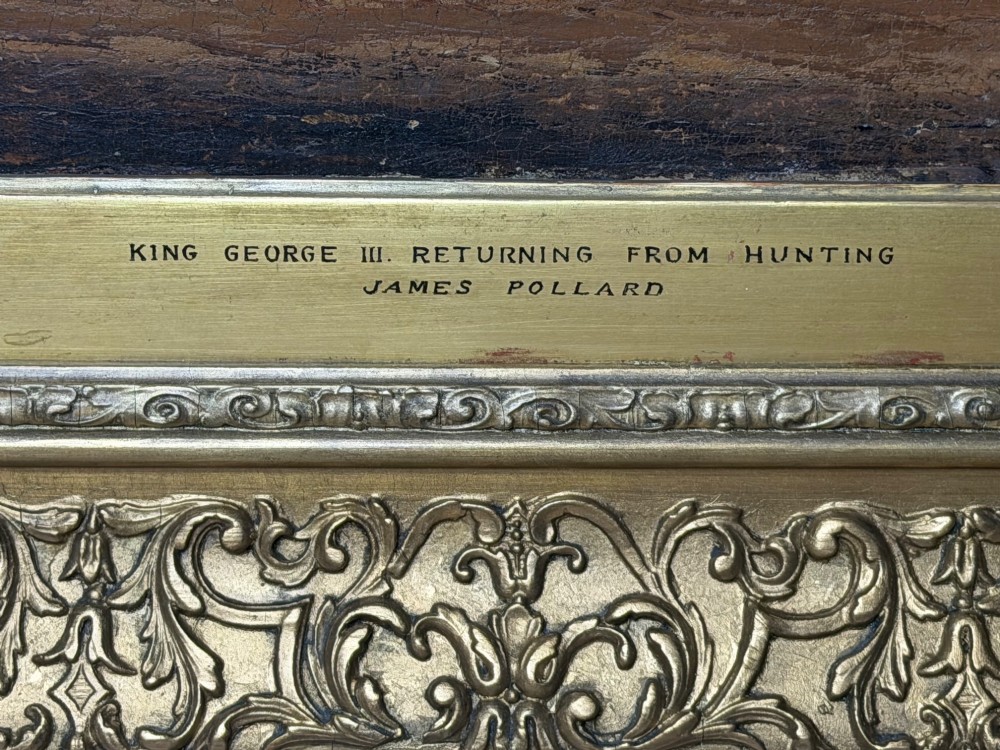An antique oil painting on canvas depicting King George and hunters on horseback with hounds before Windsor Castle, housed in an ornate carved gilt frame. View III