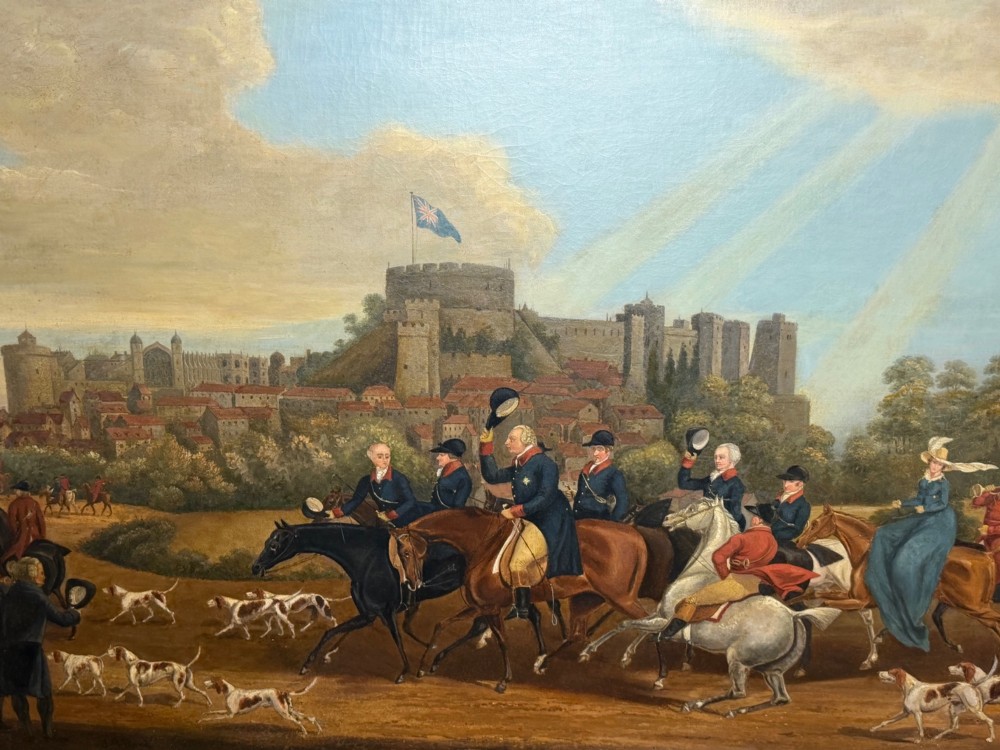 An antique oil painting on canvas depicting King George and hunters on horseback with hounds before Windsor Castle, housed in an ornate carved gilt frame. View VIII