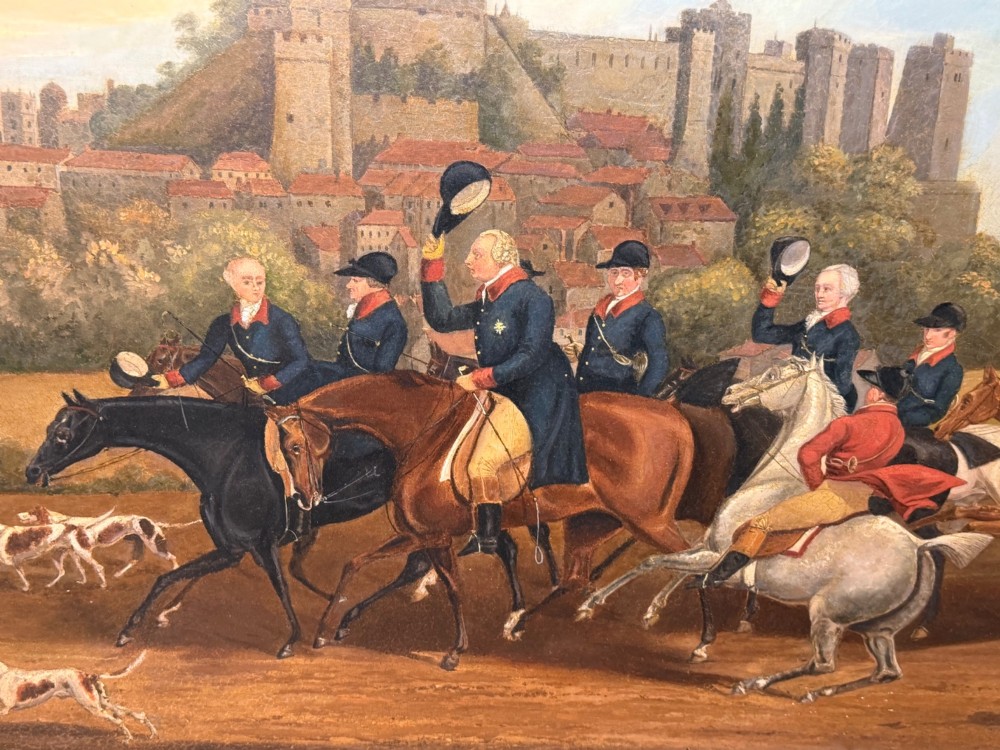 An antique oil painting on canvas depicting King George and hunters on horseback with hounds before Windsor Castle, housed in an ornate carved gilt frame. View IX