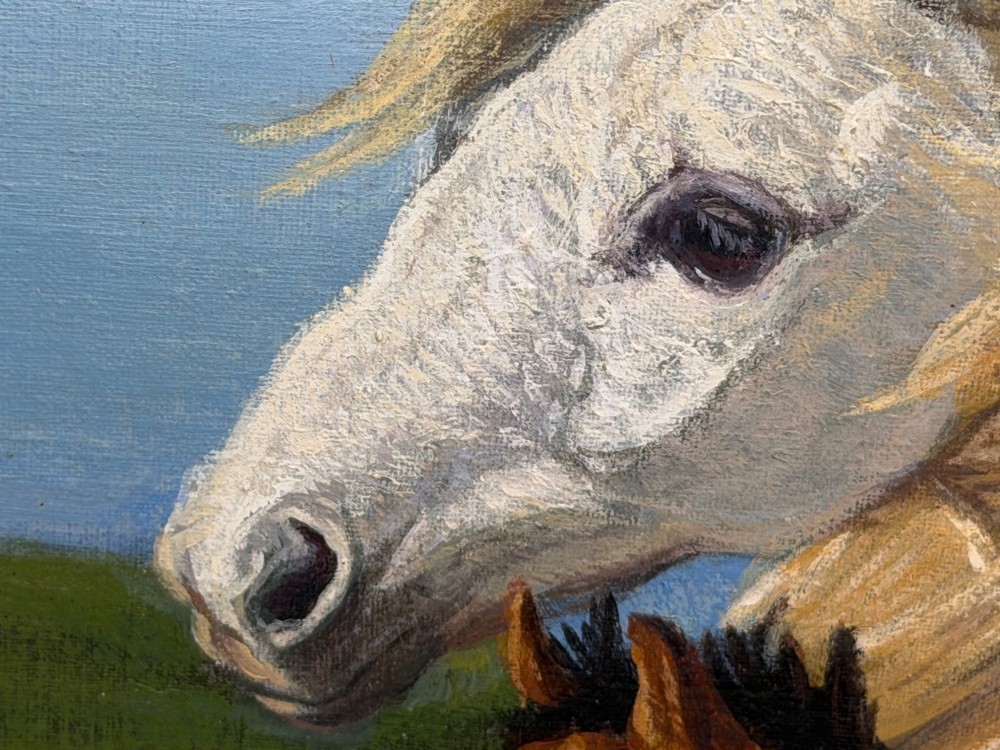 A framed oil painting featuring a grey mare standing beside a young chestnut foal on a grassy coastal headland overlooking the sea. View XII