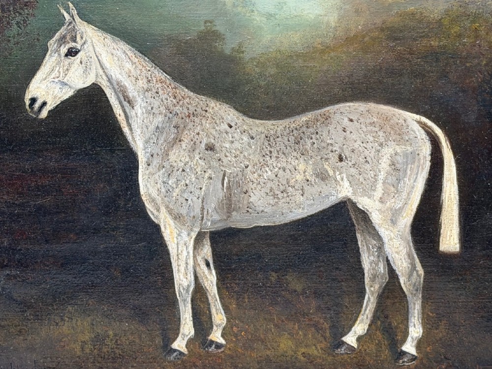 An antique oil painting depicting a standing grey mare in profile set within a heavy carved gold gilt frame. View II