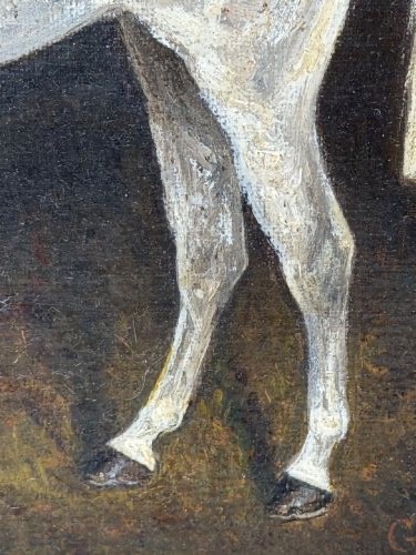 An antique oil painting depicting a standing grey mare in profile set within a heavy carved gold gilt frame. View IV