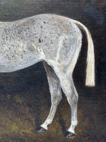 An antique oil painting depicting a standing grey mare in profile set within a heavy carved gold gilt frame. View III