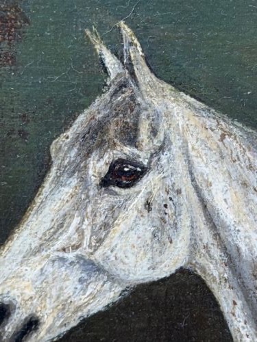 An antique oil painting depicting a standing grey mare in profile set within a heavy carved gold gilt frame. View VIII