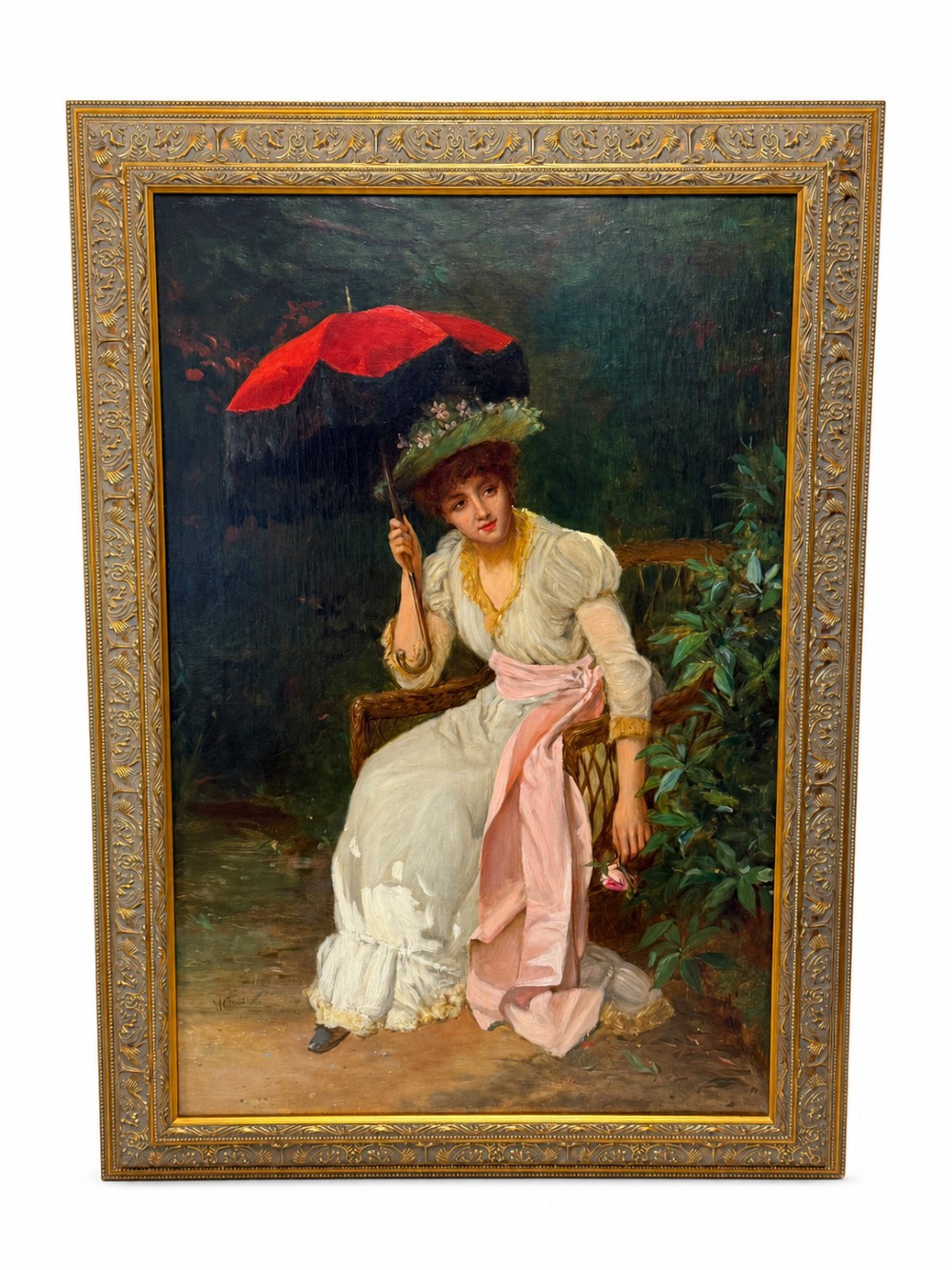 An antique oil painting depicting a seated woman in a white dress holding a red parasol, presented in an ornate carved gilded frame.