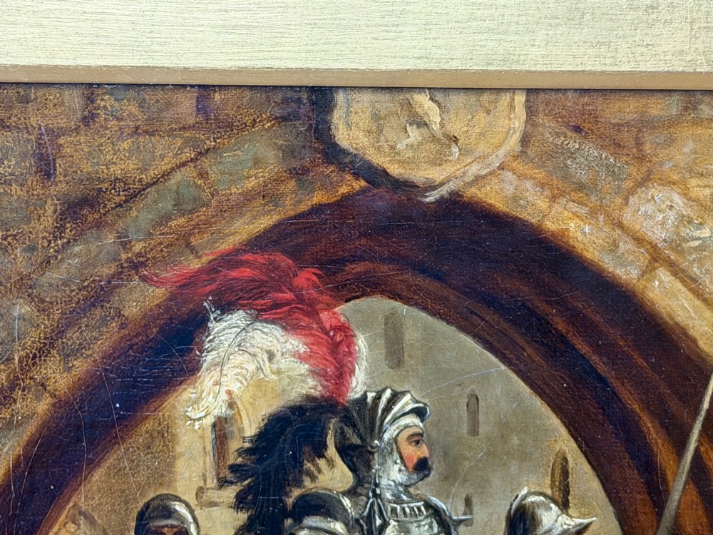 An antique oil painting depicting a knight in full armour riding a horse beneath a stone archway, framed in an ornate gilded wood frame. View IX