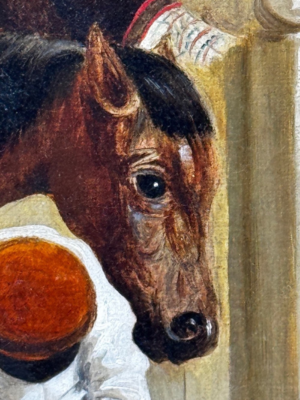 A horizontal oil painting depicting grooms tending to horses inside a stable block, housed within a fluted gilt wood frame. View III