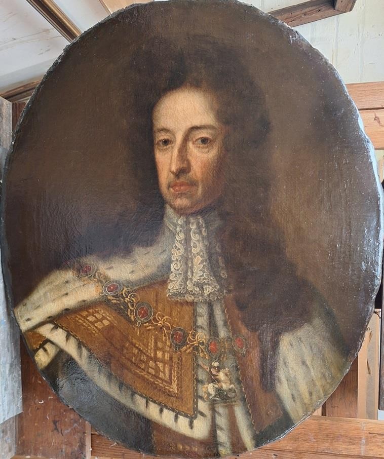 An 18th-century oil painting depicting King William III in a curled wig and ermine cloak, set within an oval aperture inside an ornate rectangular gold carved frame. View VI