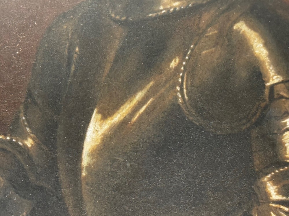 An antique profile portrait painting of a man wearing full steel armour, set within an ornate gilded frame decorated with carved shell and scroll motifs. View VIII