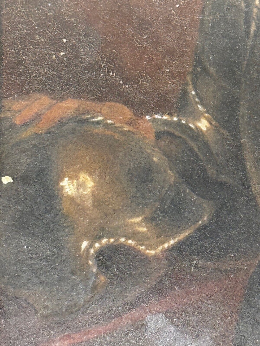 An antique profile portrait painting of a man wearing full steel armour, set within an ornate gilded frame decorated with carved shell and scroll motifs. View XII