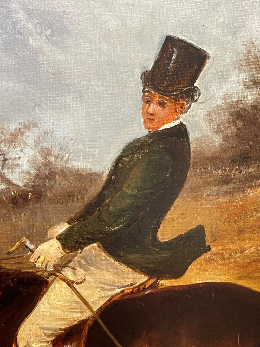 An antique Victorian oil painting depicting horse riders in red hunting coats on grey and bay horses, housed within an ornate gilt frame. View VI