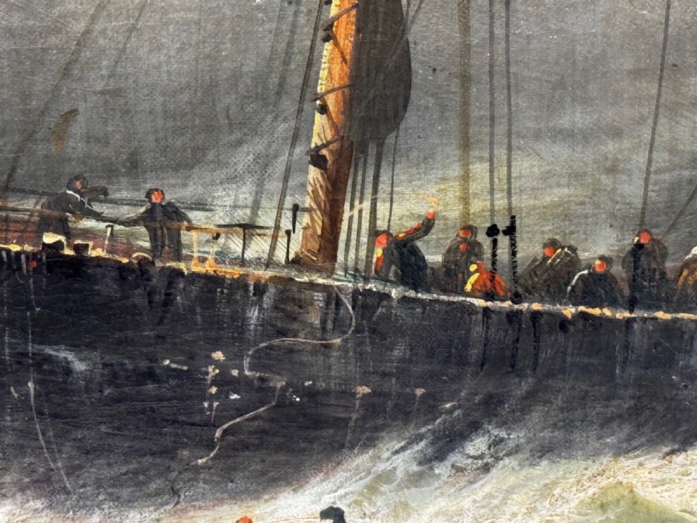 A late Victorian oil painting framed in gold depicting a steamship navigating turbulent dark green seas alongside a small rescue boat. View IV