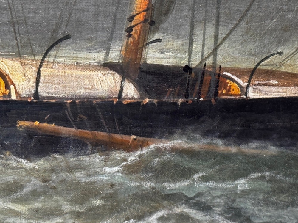 A late Victorian oil painting framed in gold depicting a steamship navigating turbulent dark green seas alongside a small rescue boat. View XIII