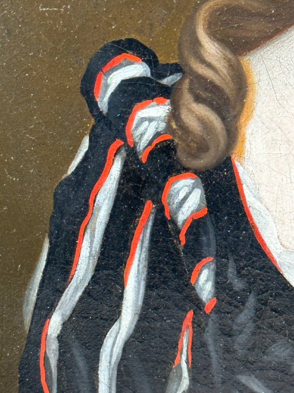 An early 18th-century oil portrait of a young woman wearing a dark gown with slashed sleeves, presented in a square giltwood frame with an oval spandrel. View IX