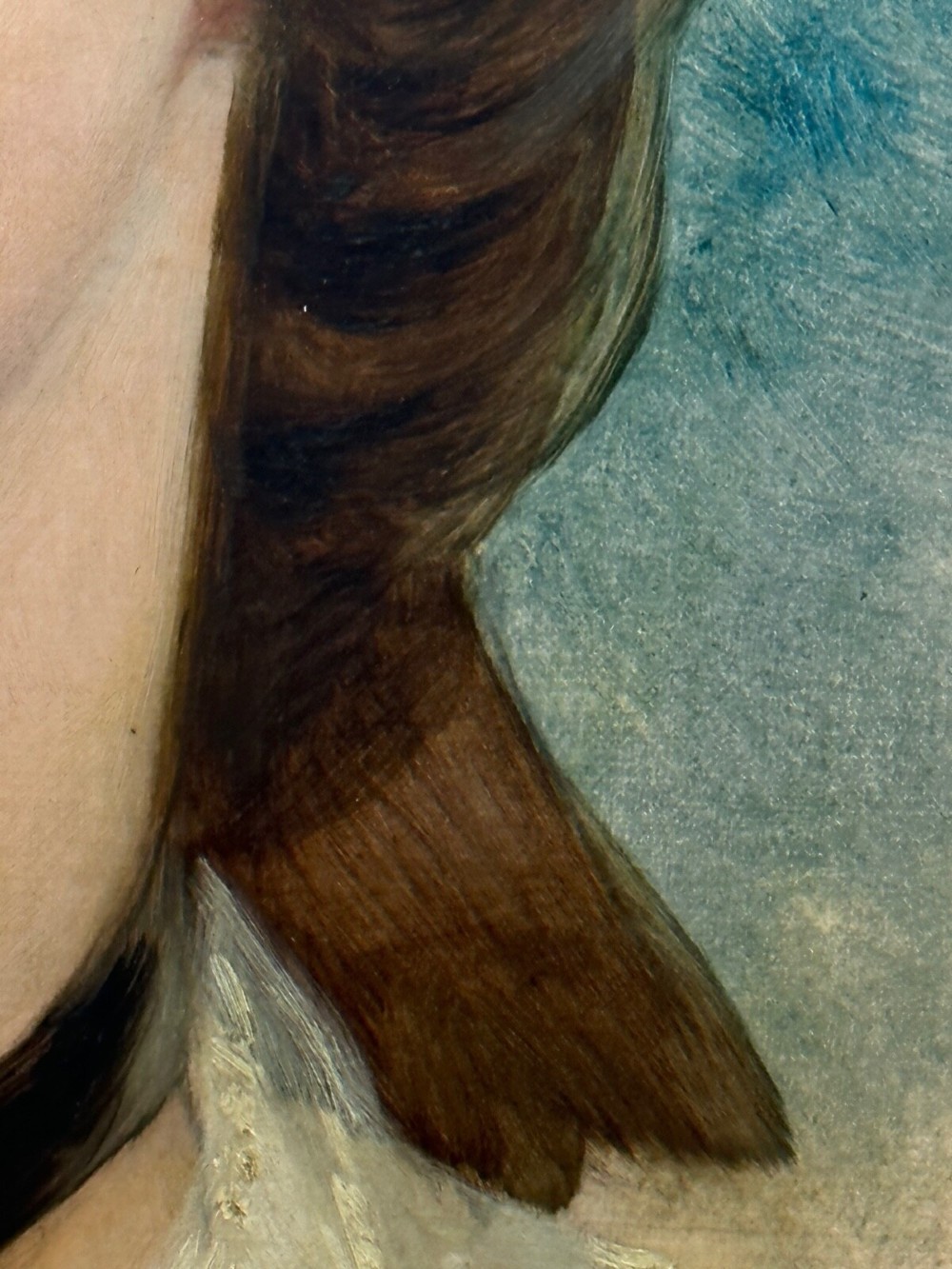 A Victorian oil painting on canvas depicting a young woman with dark hair tied with a black ribbon, displayed within an intricate pierced gold gilt frame with an oval aperture. View XI