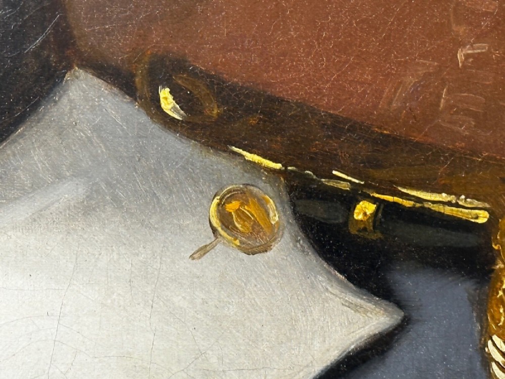A 19th-century oil painting depicting Napoleon I in a military uniform within an oval spandrel and a rectangular gilded frame. View VII