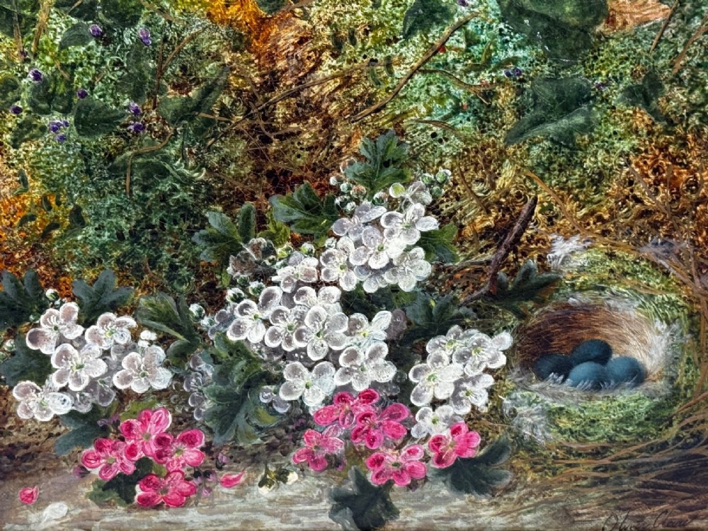 A Victorian oil painting depicting white and pink blossoms alongside a bird nest with three blue eggs, framed in an ornate pierced gold leaf frame. View XV
