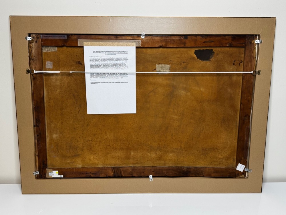 A framed oil painting depicting a three-masted sailing ship navigating dark blue seas under a cloudy sky within a gold gilt frame. View XII