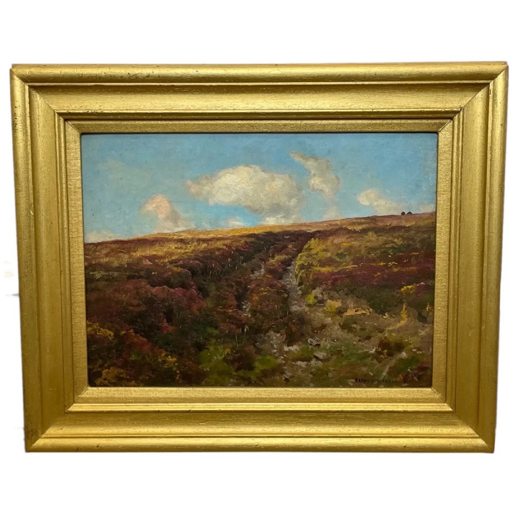 An oil painting depicting an open Exmoor moorland with purple heather under a blue sky, set within a wide gilded wooden frame.
