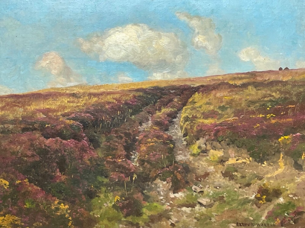 An oil painting depicting an open Exmoor moorland with purple heather under a blue sky, set within a wide gilded wooden frame. View XII