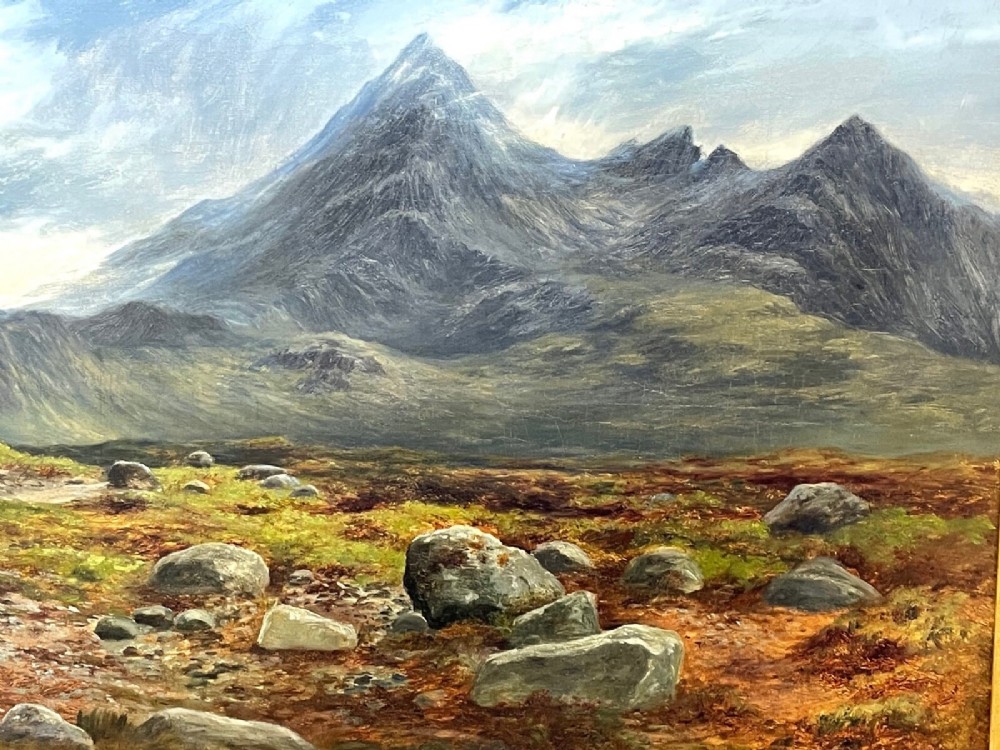 A Victorian oil painting depicting the mountain peak of Sgurr nan Gillean in Skye, housed in a wide ornate gold gilt frame. View II