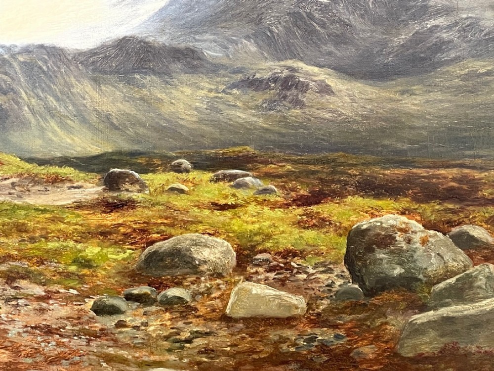 A Victorian oil painting depicting the mountain peak of Sgurr nan Gillean in Skye, housed in a wide ornate gold gilt frame. View X