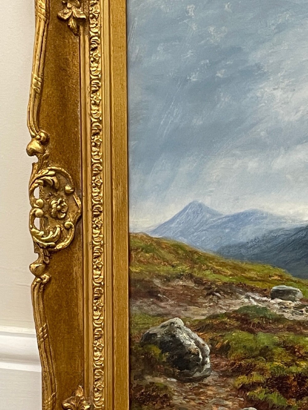 A Victorian oil painting depicting the mountain peak of Sgurr nan Gillean in Skye, housed in a wide ornate gold gilt frame. View XIII