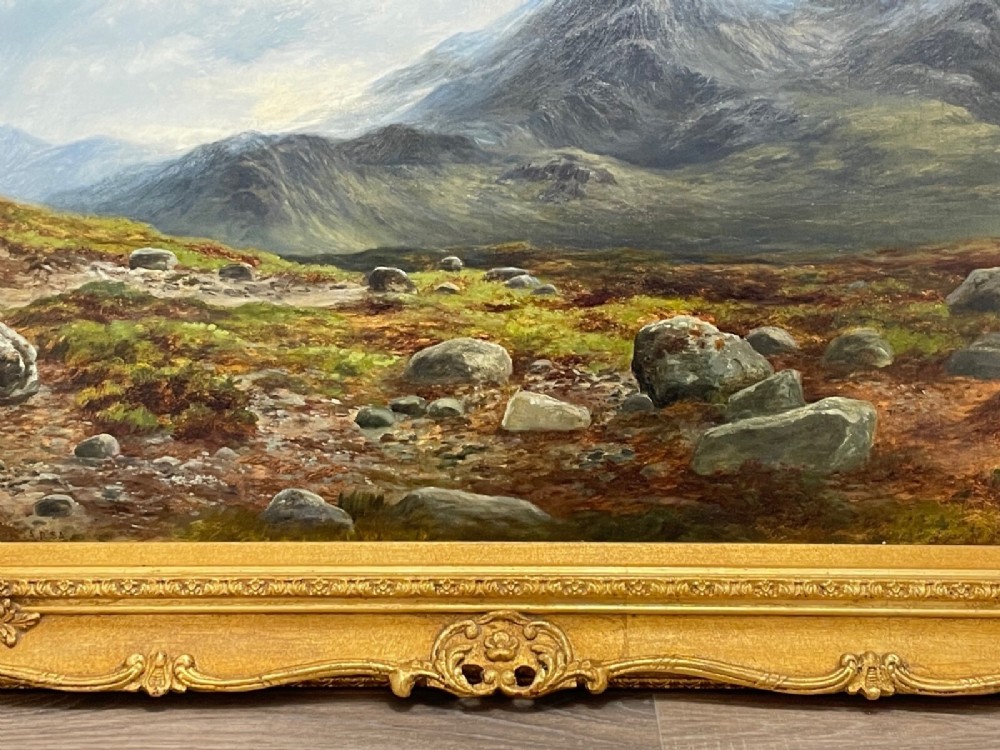 A Victorian oil painting depicting the mountain peak of Sgurr nan Gillean in Skye, housed in a wide ornate gold gilt frame. View XIV