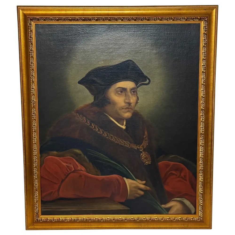 An oil painting on canvas depicting Sir Thomas More wearing a Tudor velvet cap and chain of office, enclosed within an ornate gilt wooden frame.